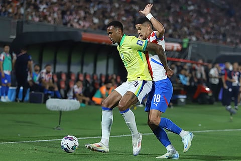 2026 FIFA World Cup Qualifying, Brazil vs Paraguay: Brazil's Gabriel, left, is challenged by Paraguay's Alex Arce